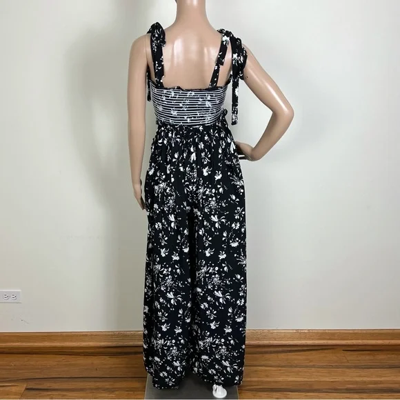 FREE PEOPLE REVOLVE BLACK FLORAL PRINT WIDE-LEG JUMPSUIT - Picture 10 of 11